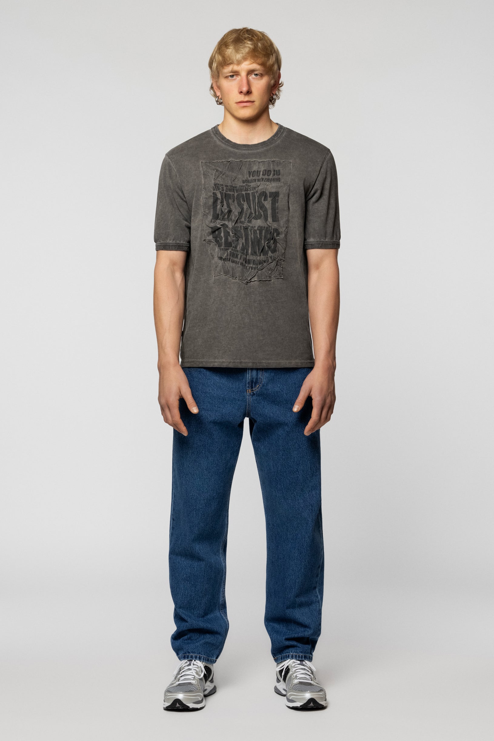 Grey oversized T-shirt with a fading effect and a bold print