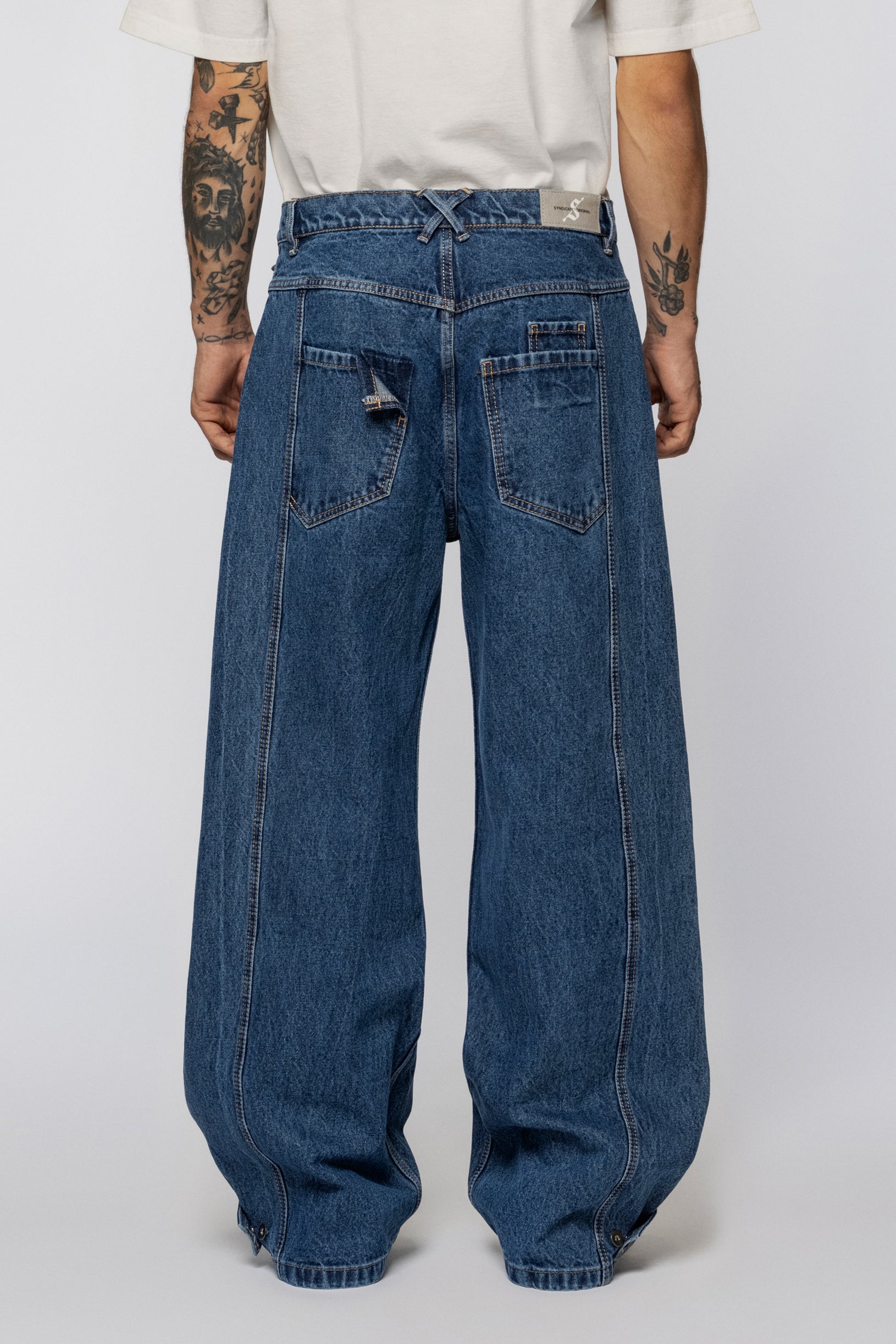 Blue wide fit jeans with a drawstring belt and wide legs