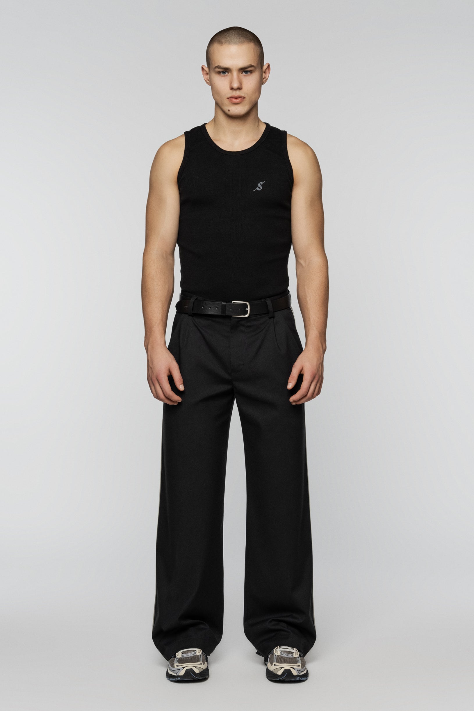 Black viscose pants with stripes and a straight, relaxed cut