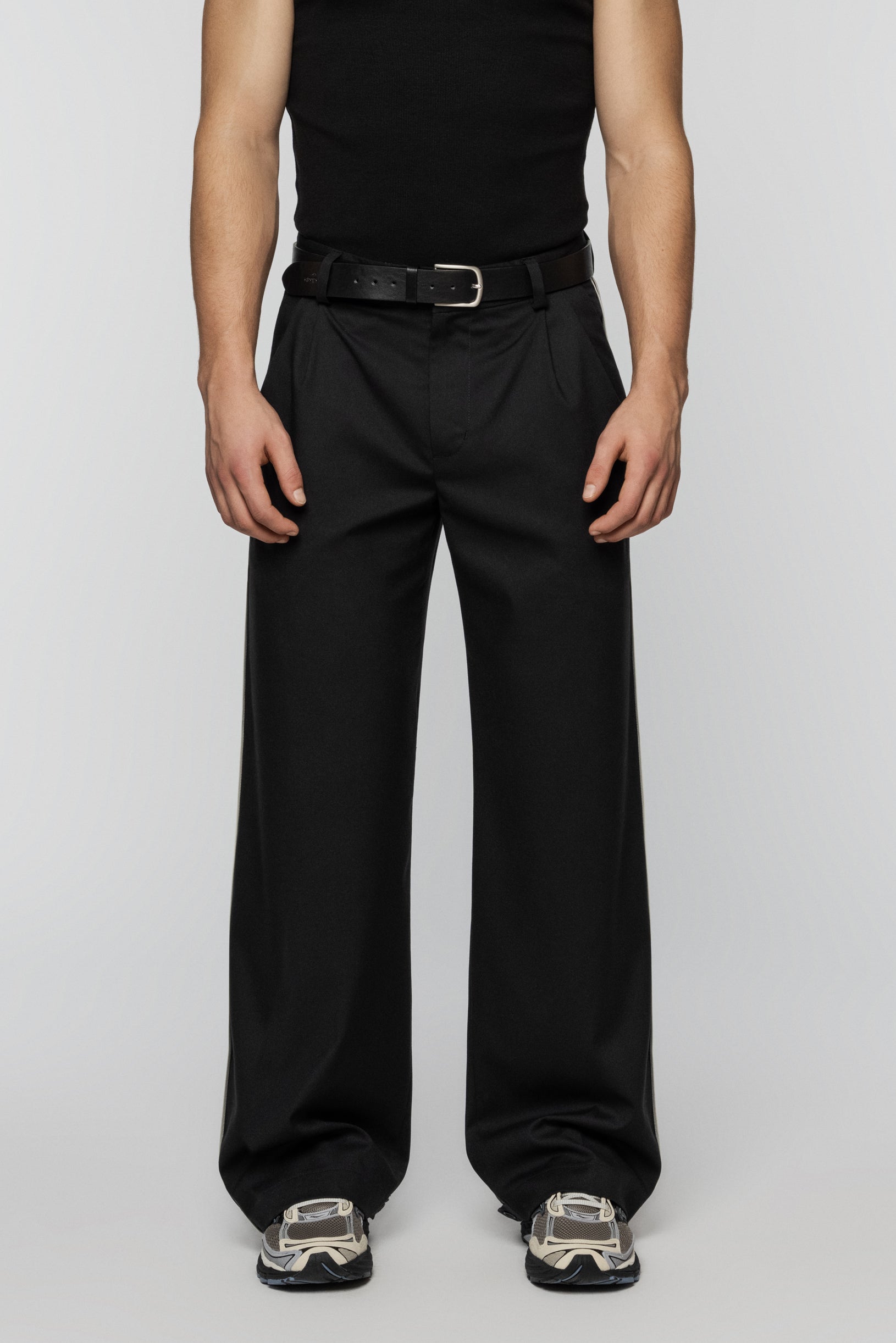 Black viscose pants with stripes and a straight, relaxed cut