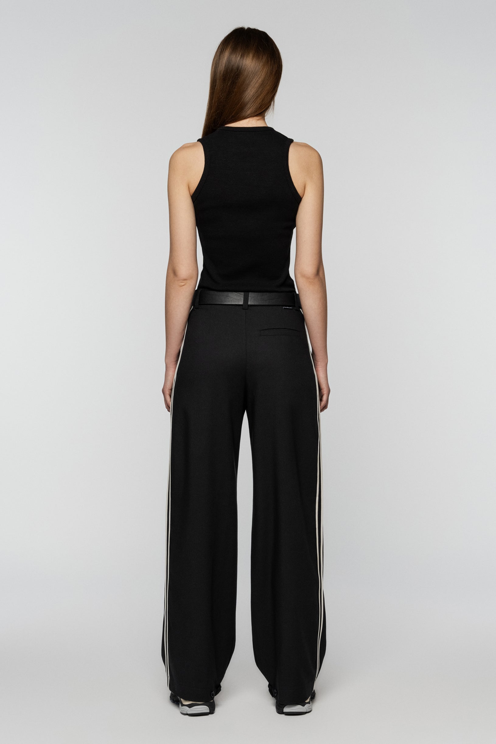 Black viscose pants with stripes and a straight, relaxed cut
