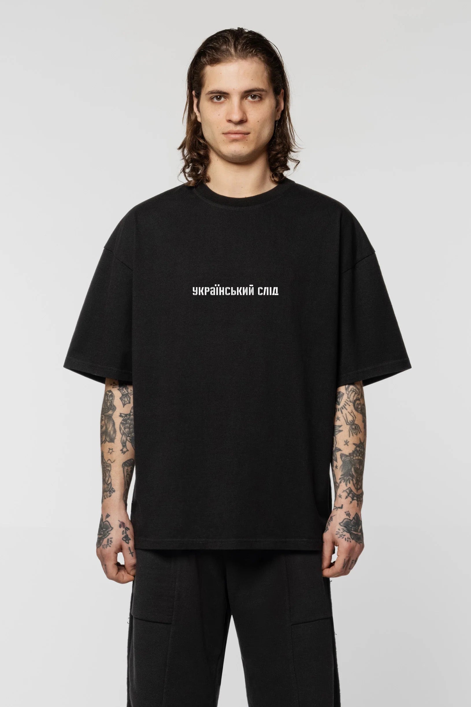 Black oversize t-shirt with the print "Український слід"