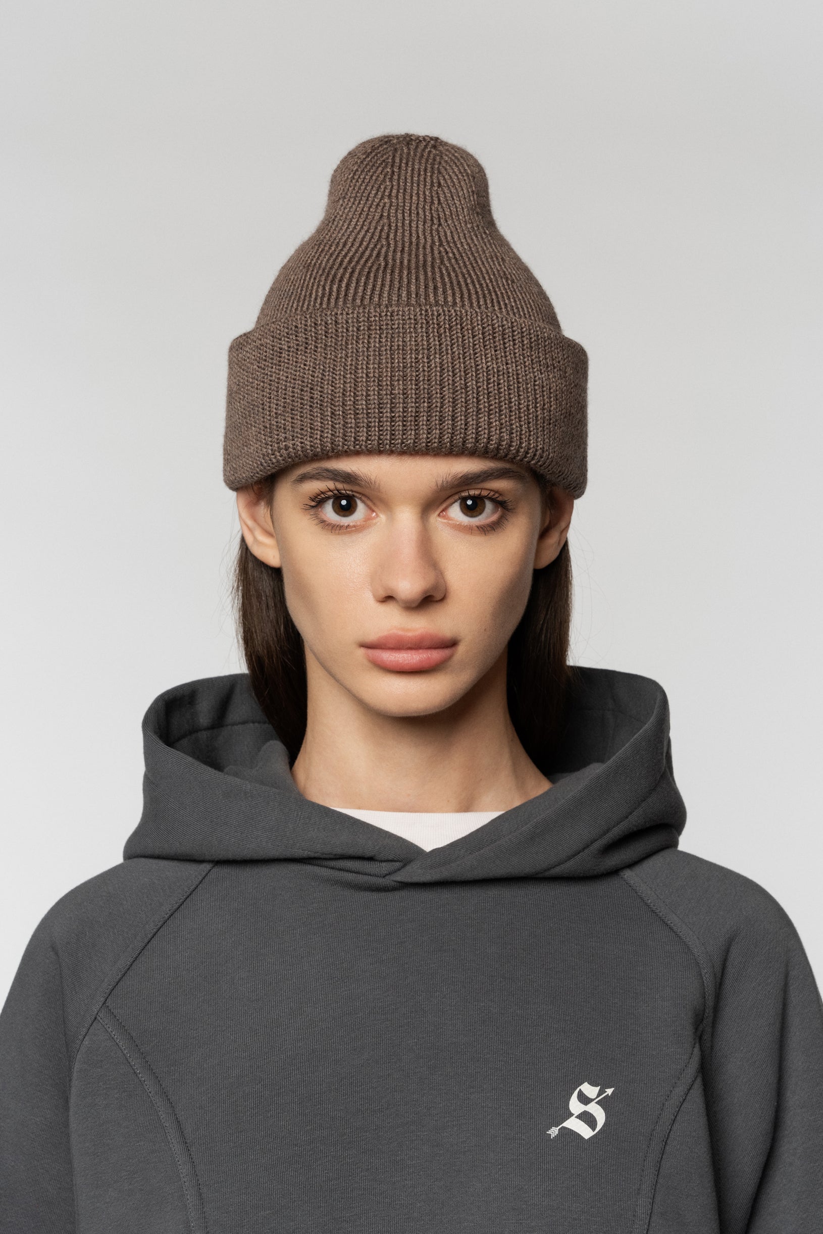 Knitted hat made of merino wool in bitter chocolate color