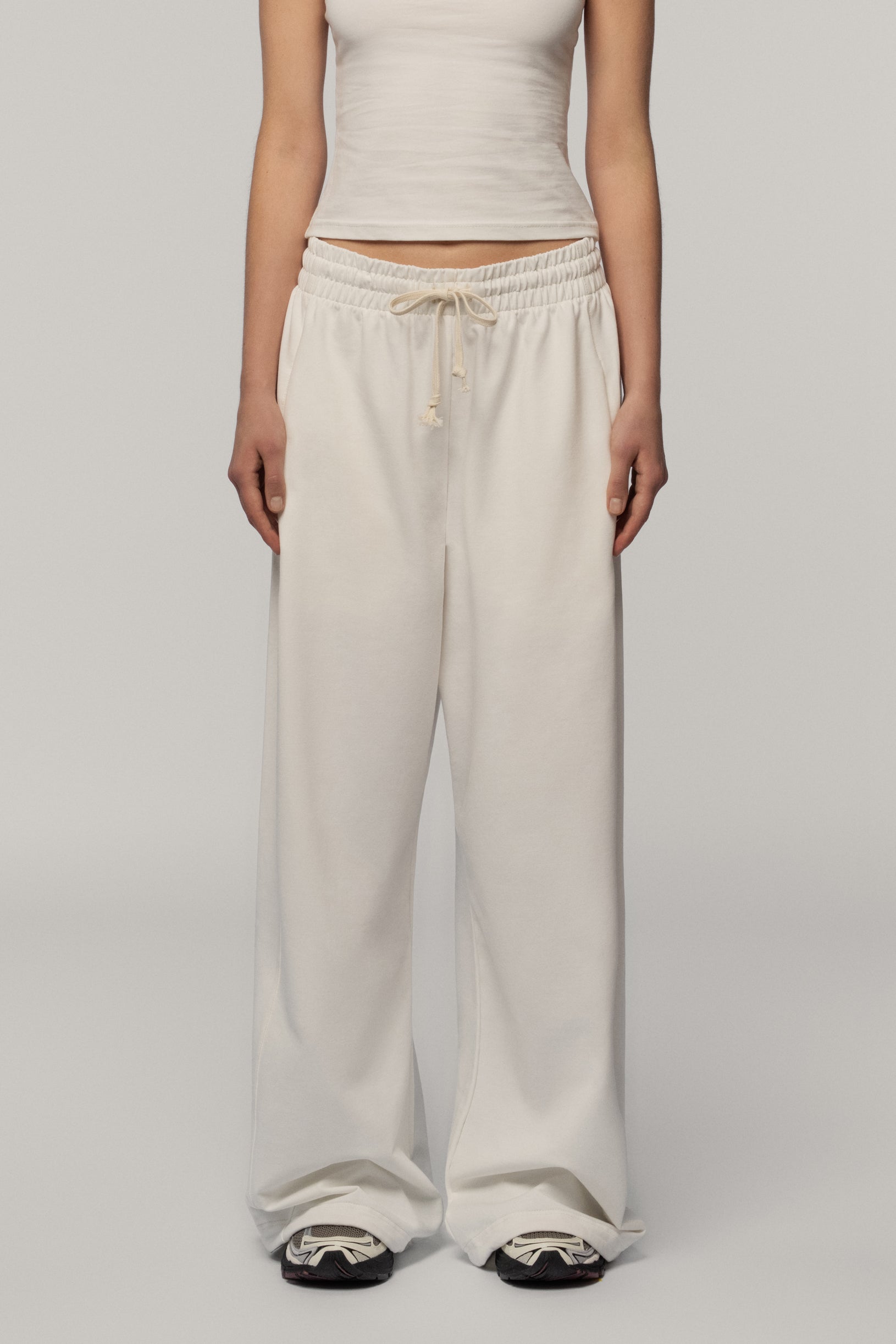 Штани з бавовни молочні