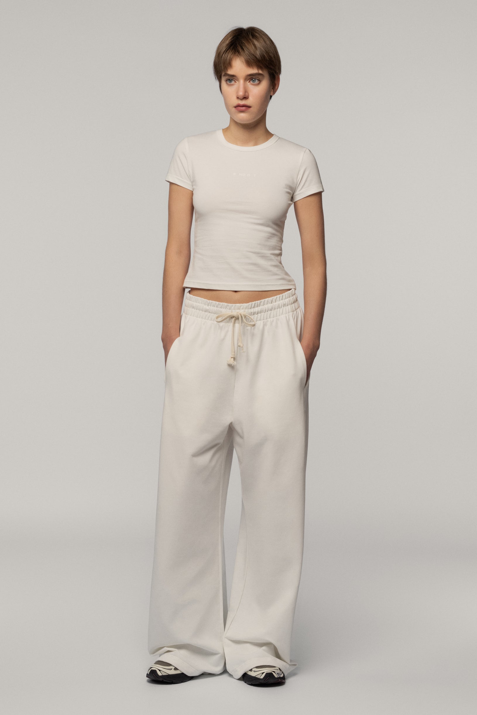 Штани з бавовни молочні