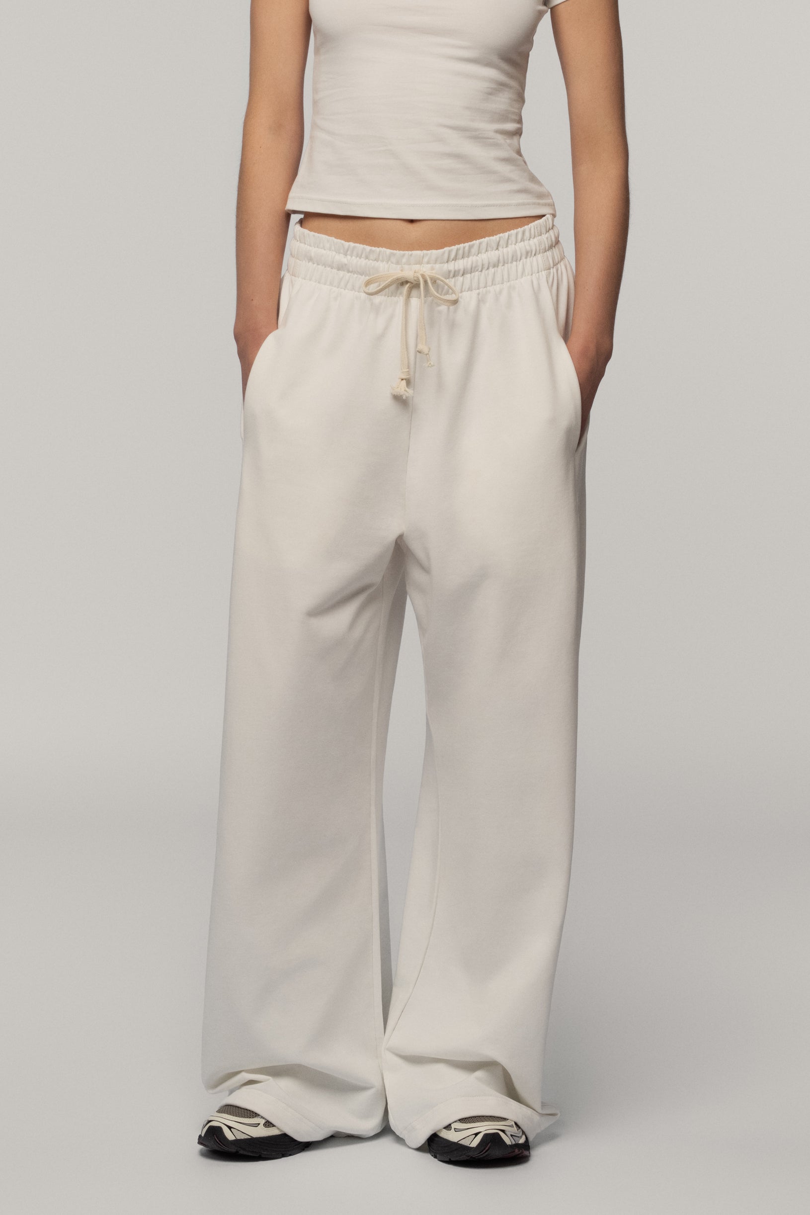 Штани з бавовни молочні