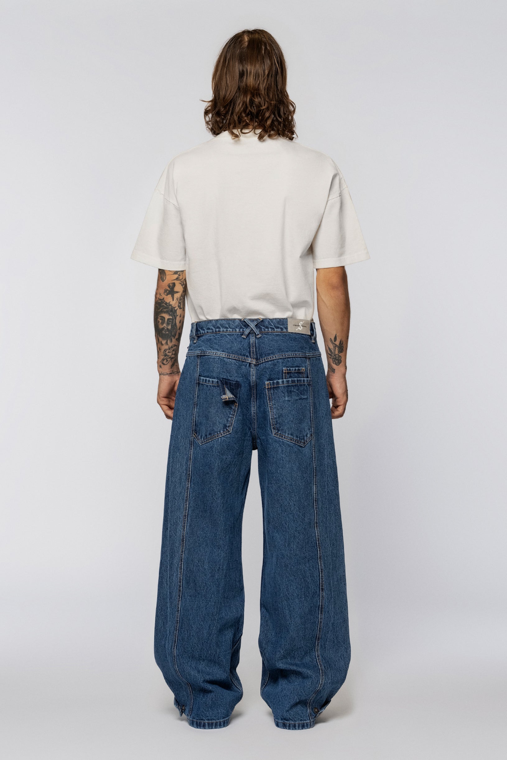 Blue wide fit jeans with a drawstring belt and wide legs