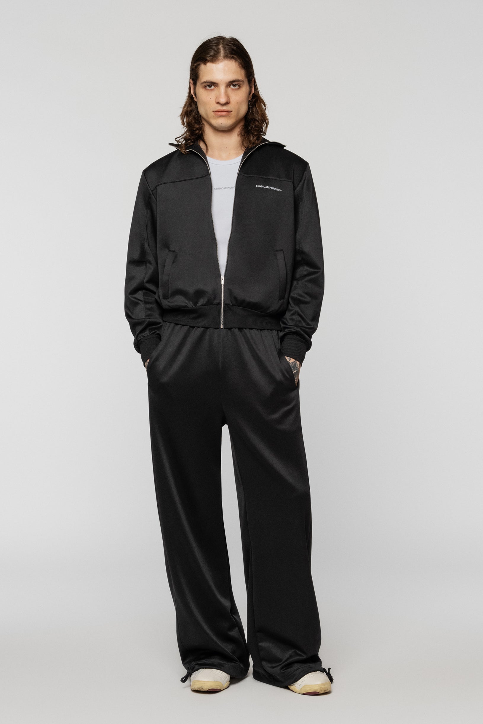 Black sports jacket with a zipper, made of polyester