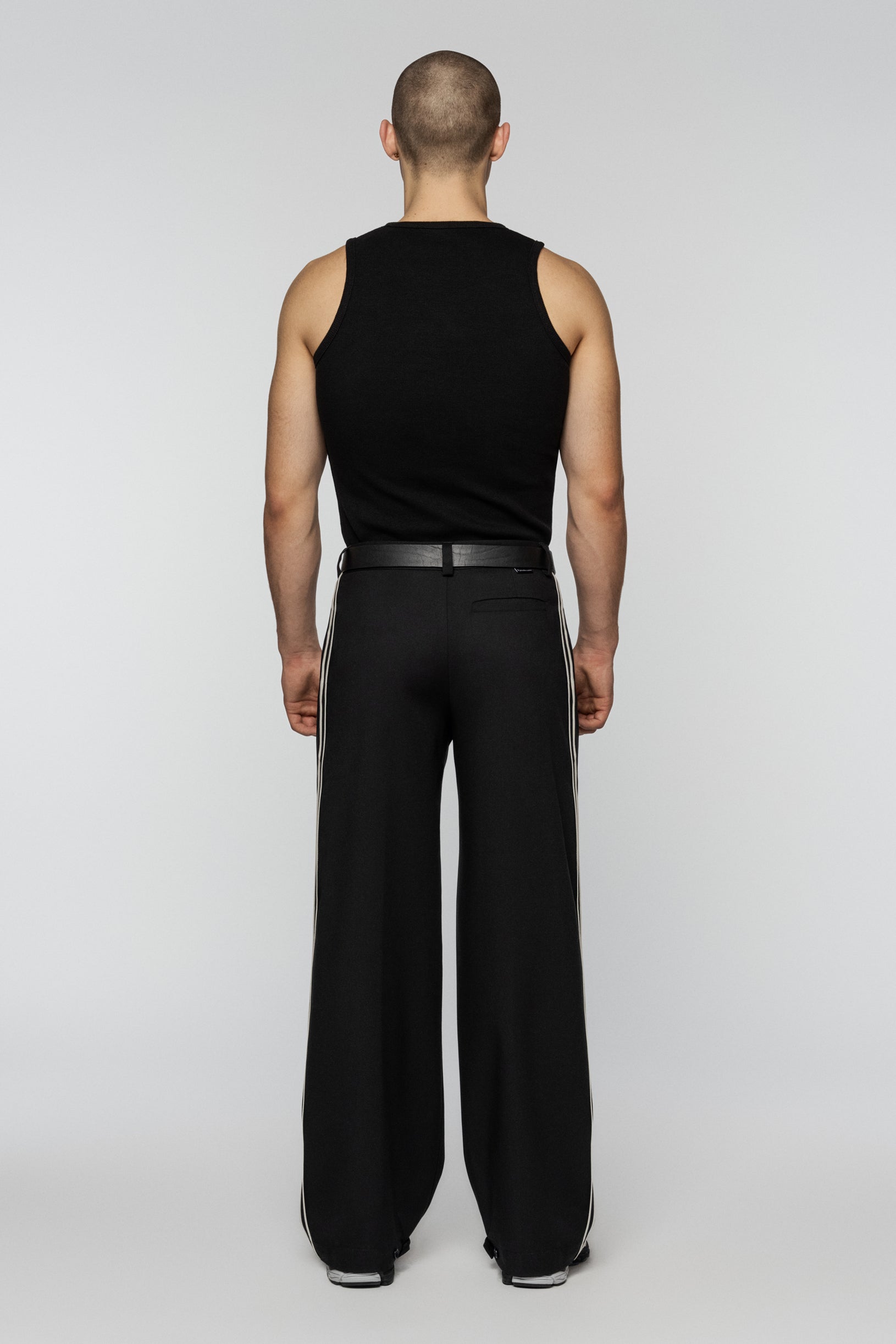 Black viscose pants with stripes and a straight, relaxed cut