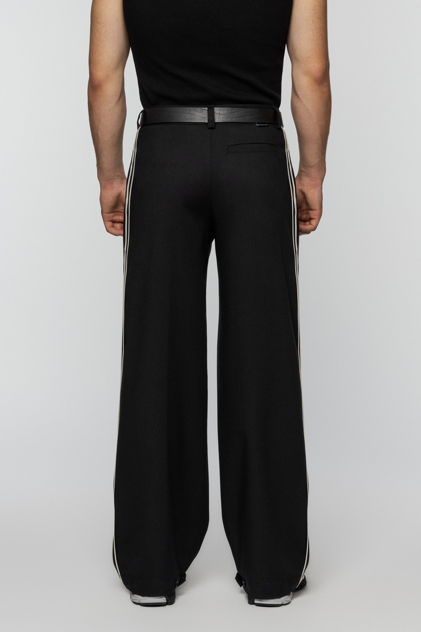 Black viscose pants with stripes and a straight, relaxed cut