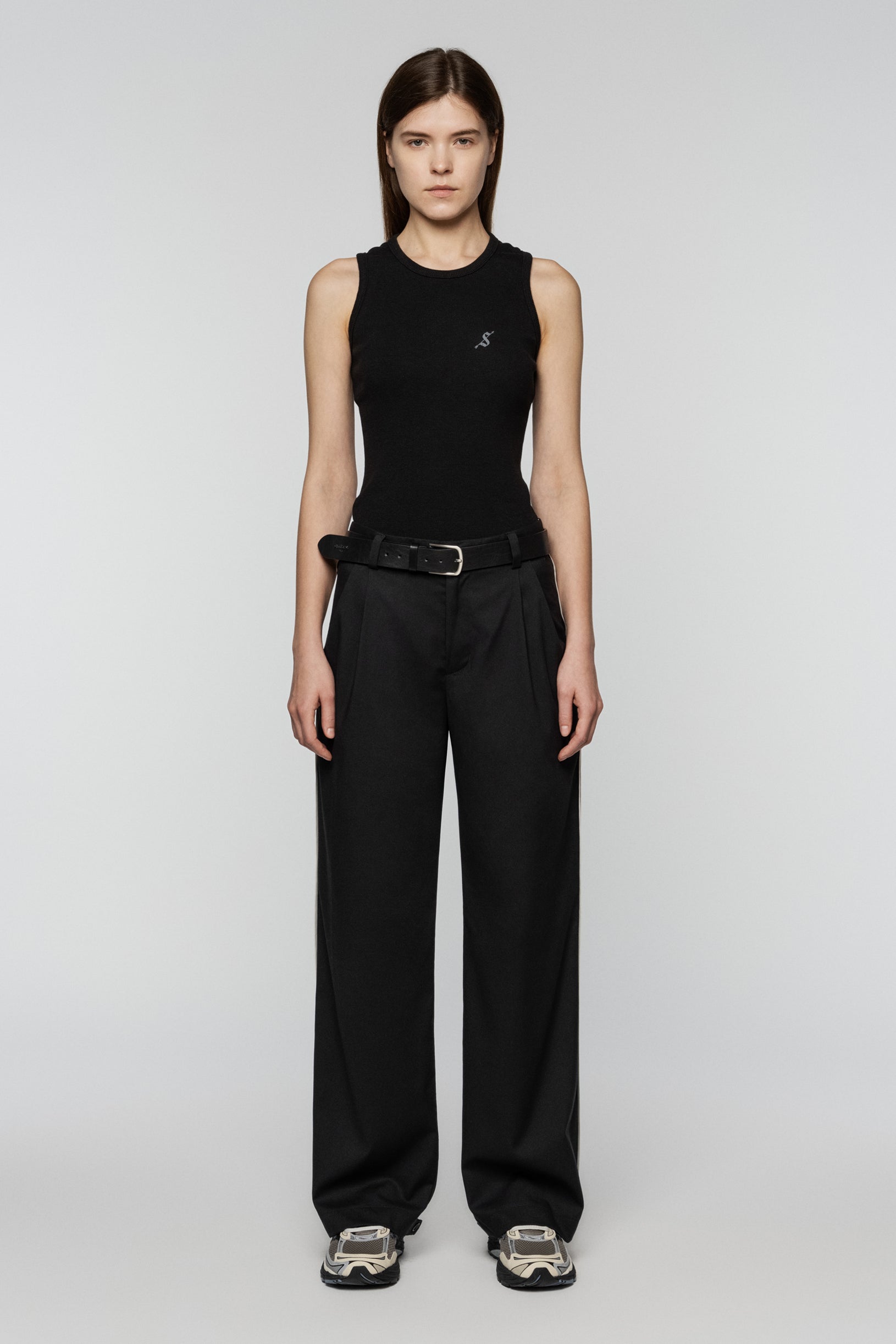 Black viscose pants with stripes and a straight, relaxed cut