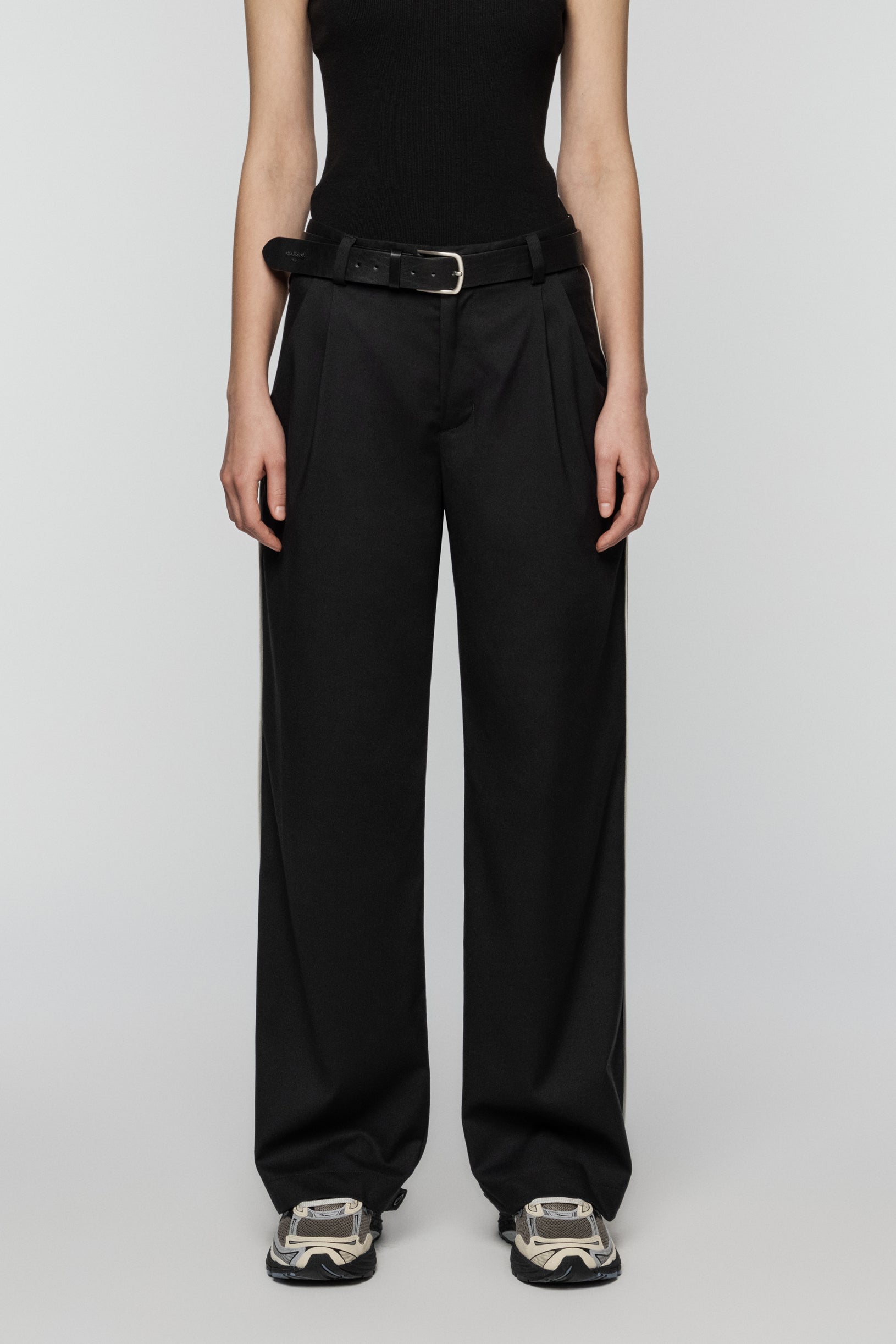 Black viscose pants with stripes and a straight, relaxed cut
