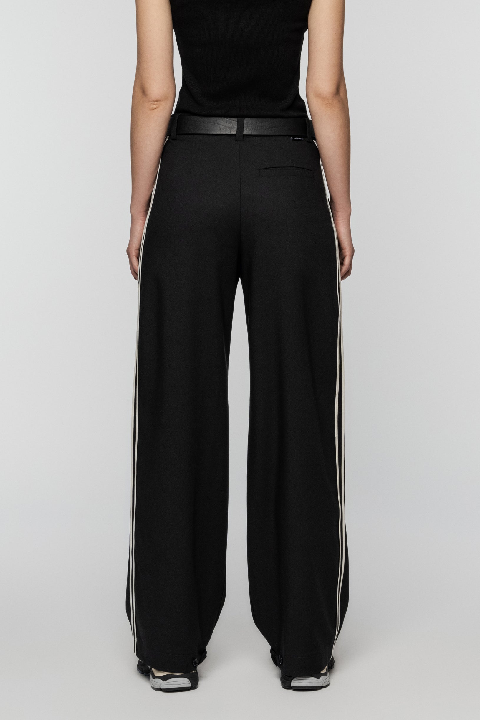 Black viscose pants with stripes and a straight, relaxed cut